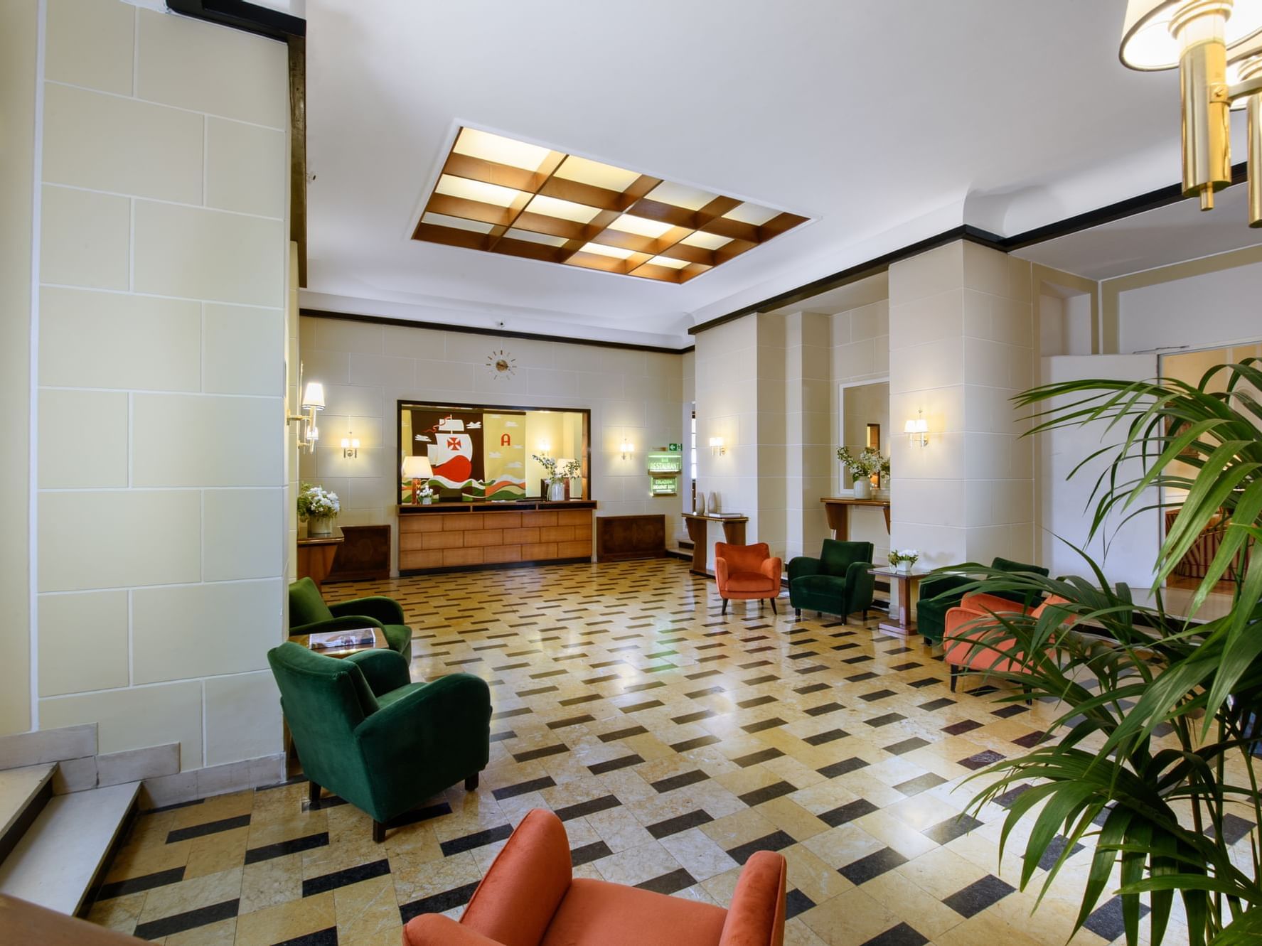 Hotel lobby with elegant decor and comfortable seating area at Bettoja Hotel Atlantico