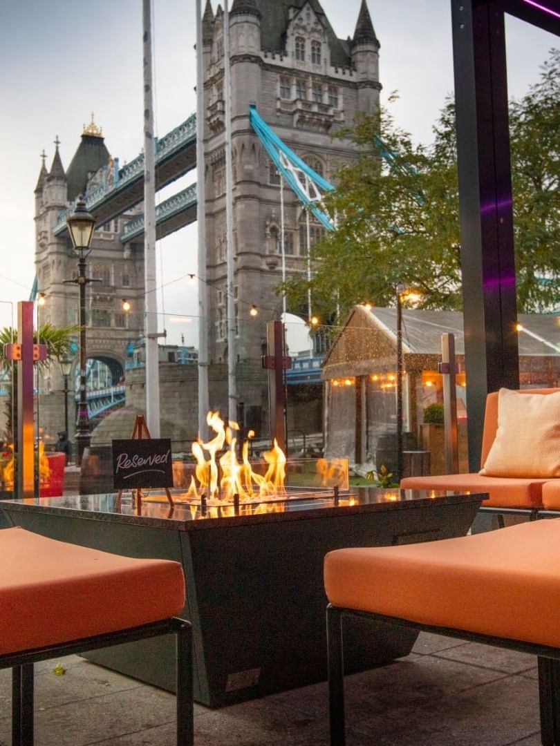 Lounge with a fireplace & Bridge view at Clermont Hotel Group