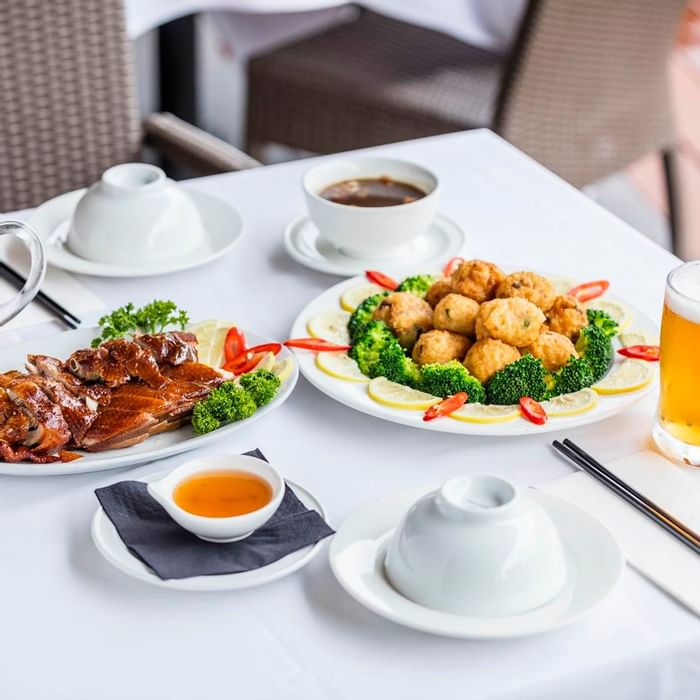 Dishes & cocktails served on a table at Darwin Airport Hotels