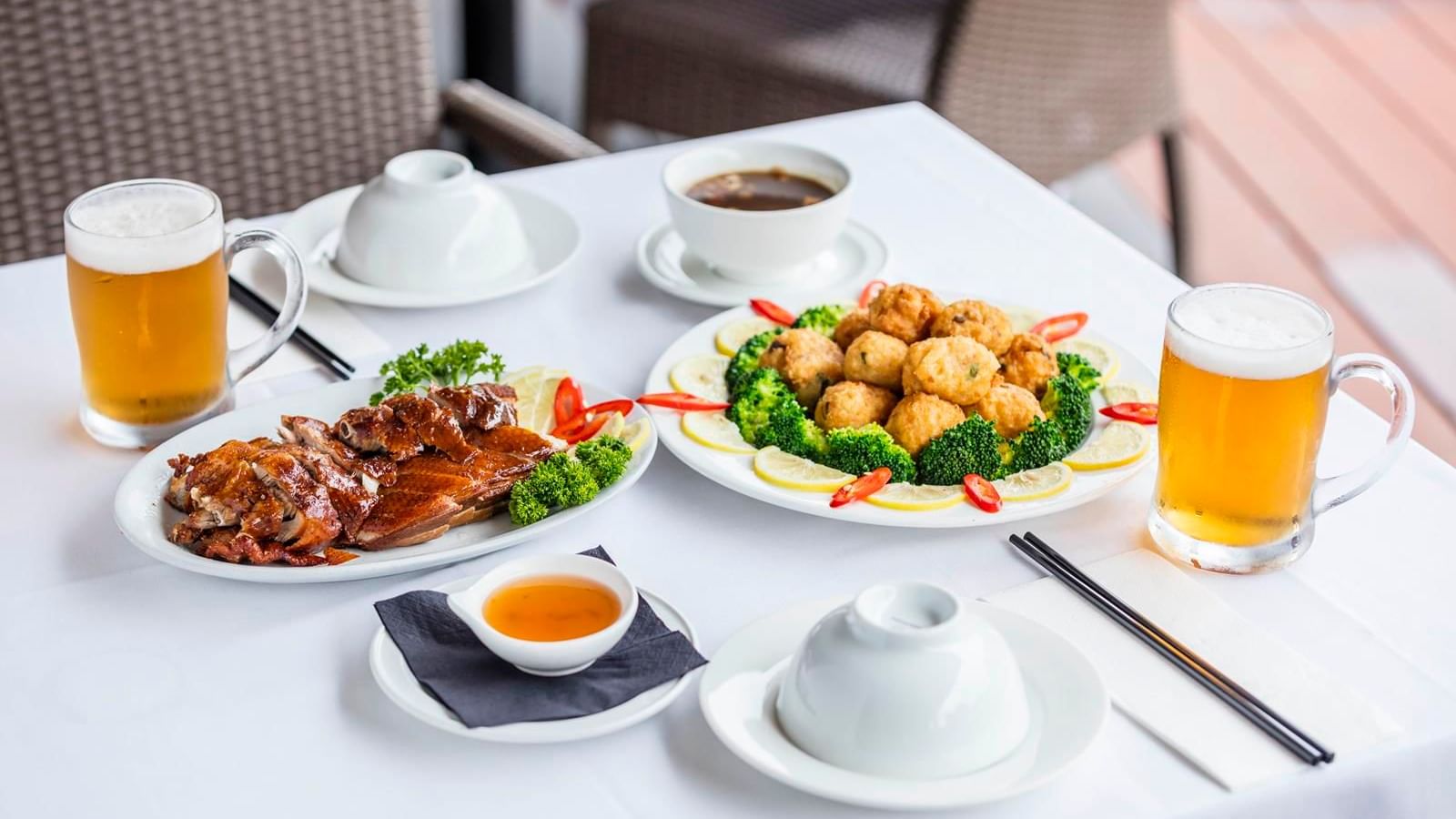 Dishes & cocktails served on a table at Darwin Airport Hotels
