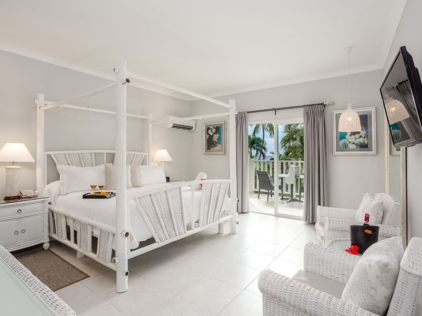 Comfy bed in Oceanfront Honeymoon Suite at Sugar Bay Barbados