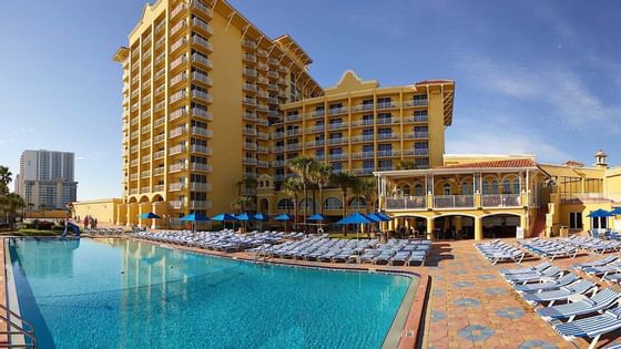 outdoor pool with hotel in background