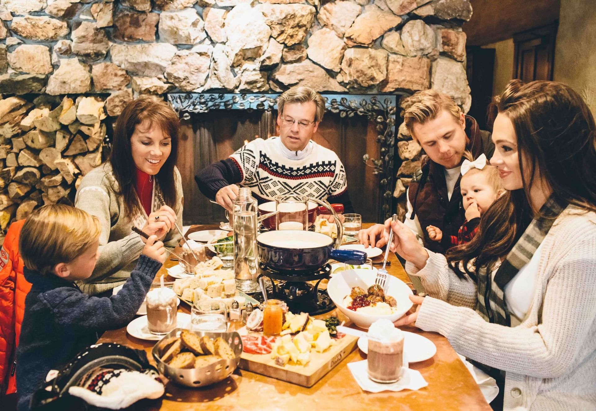 a family eatting dinner at a table