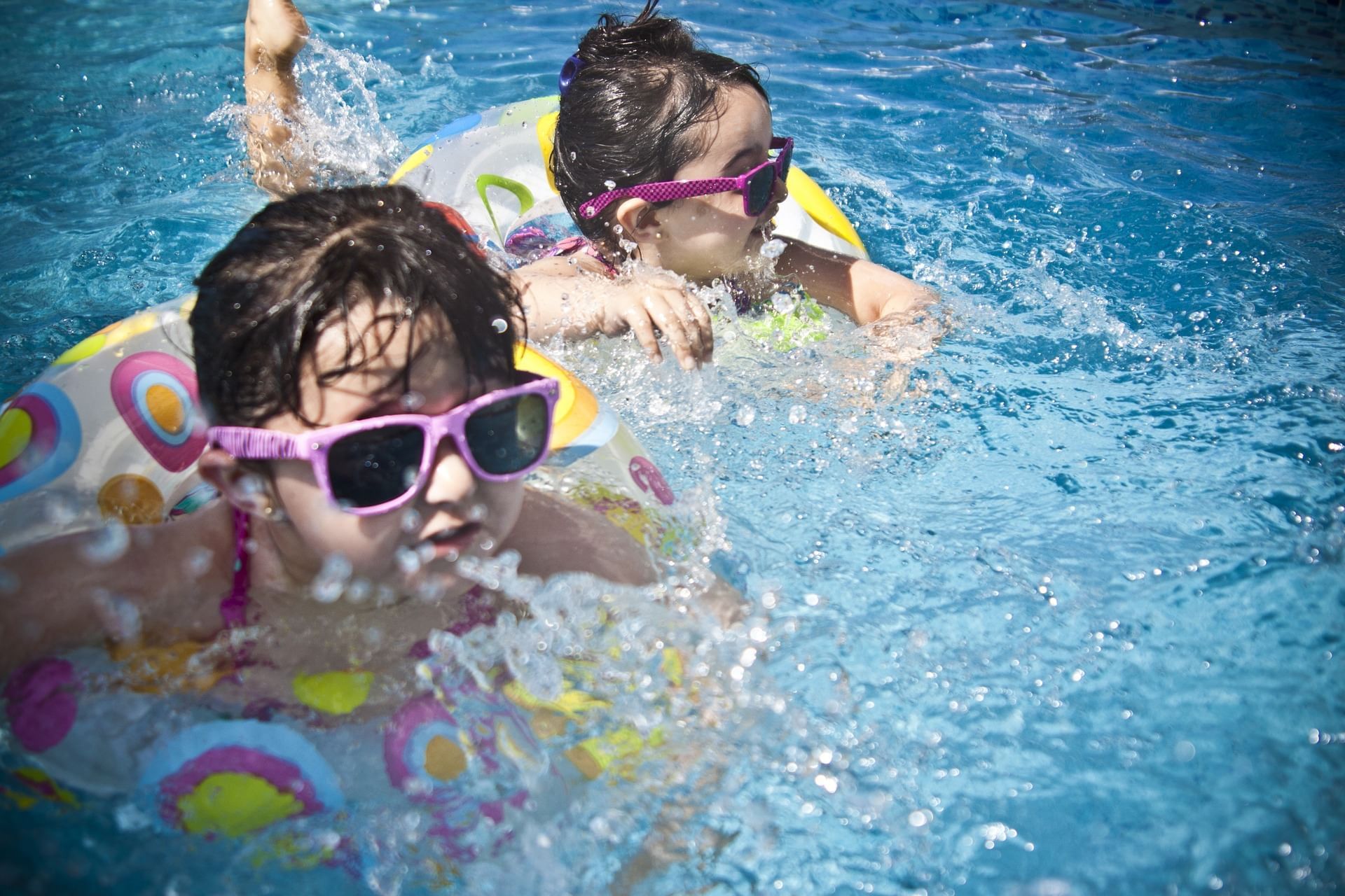 Two kids enjoying in the pool at Lake Buena Vista Resort Village & Spa