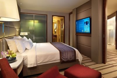 Modern interior & decor in Junior Suit with carpeted floors, A One World Hotel room