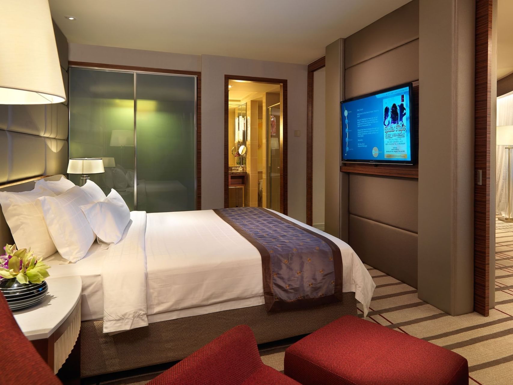 Modern interior & decor in Junior Suit with carpeted floors, A One World Hotel room