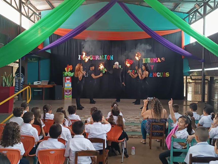 Group of people performing on a stage at Fiesta Resort