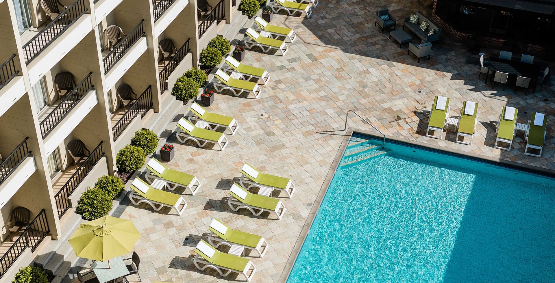 Coast Capri Hotel pool and pool sun deck