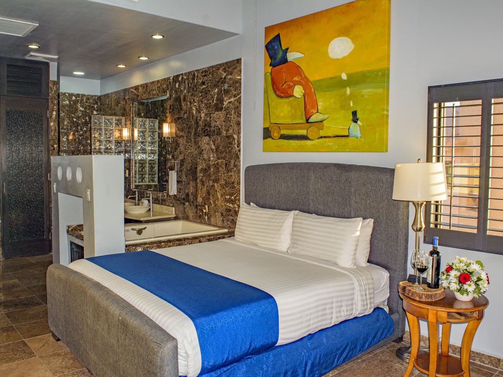 Interior of the Honey Moon Suite with king bed at Peñasco Hotel