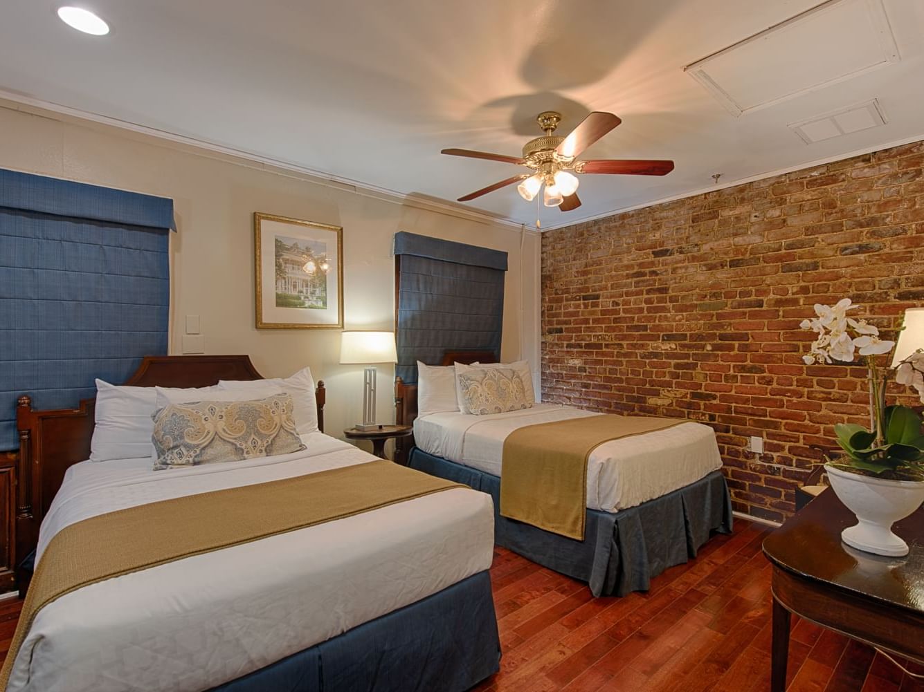 Interior of Petite Two Double Beds Room at Hotel St. Pierre