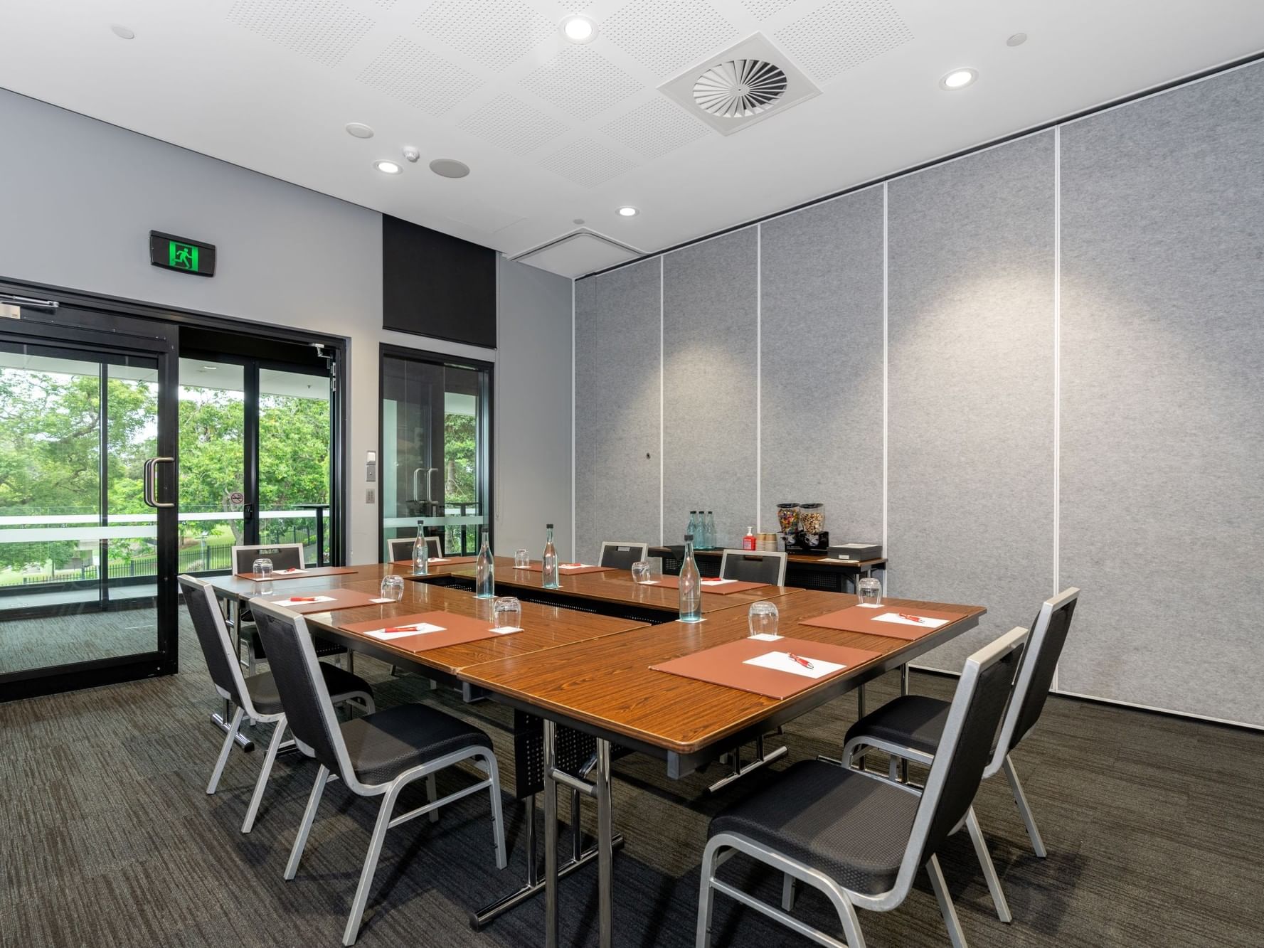 Modern boardroom meeting space in Brisbane with executive-style table setup, natural light, and conference facilities at Hotel Grand Chancellor Brisbane.
