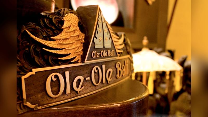 Ole-Ole Bali carved on a wooden furniture at Sunway Resort