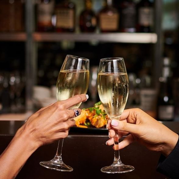 Toasting champaign in Meze Bar at Novotel Glen Waverley