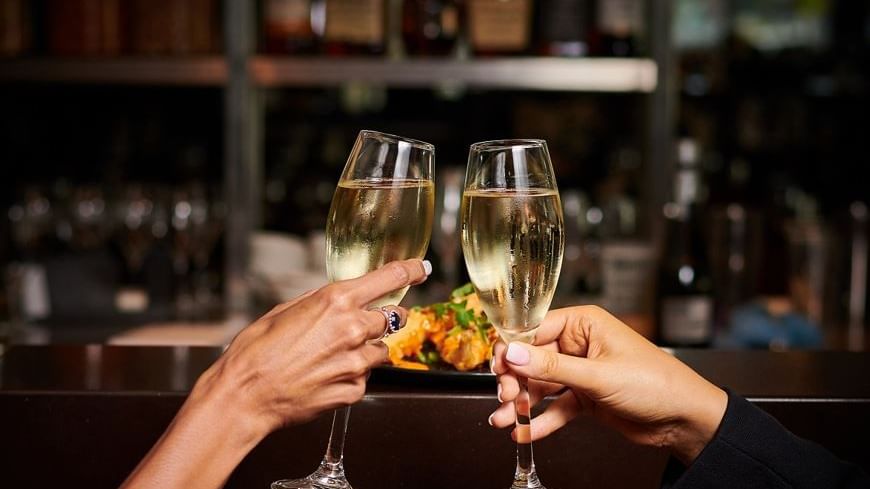 Toasting champaign in Meze Bar at Novotel Glen Waverley