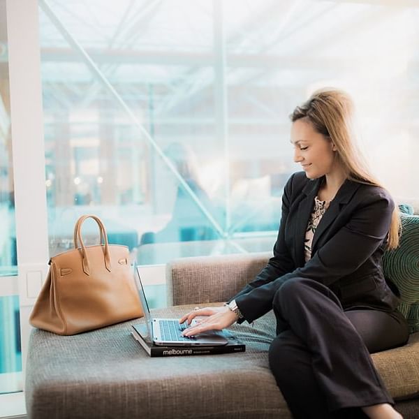 Close up on a lady working at Novotel Melbourne on Collins