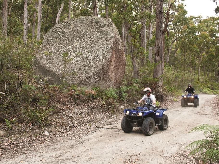 People riding on quad bikes at Freycinet Lodge