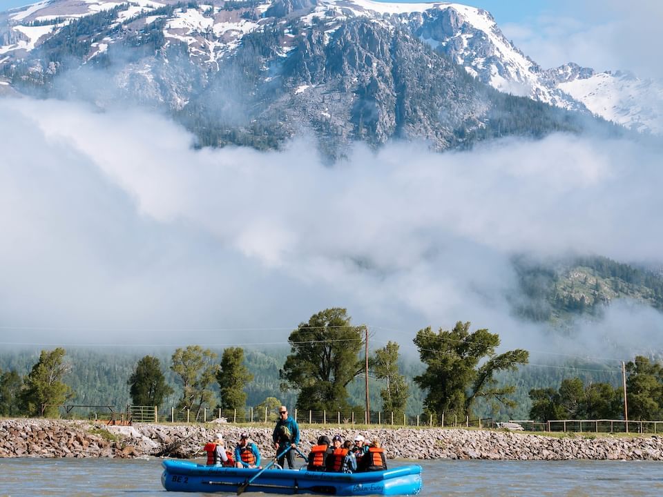 People on a Scenic River Float experience near Hotel Jackson