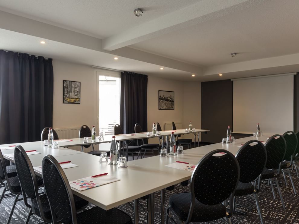 Interior of a meeting room at The Originals Hôtel Acadine