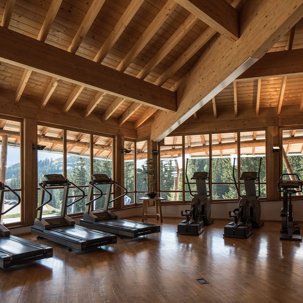 Interior of gym with treadmills at Falkensteiner Hotels