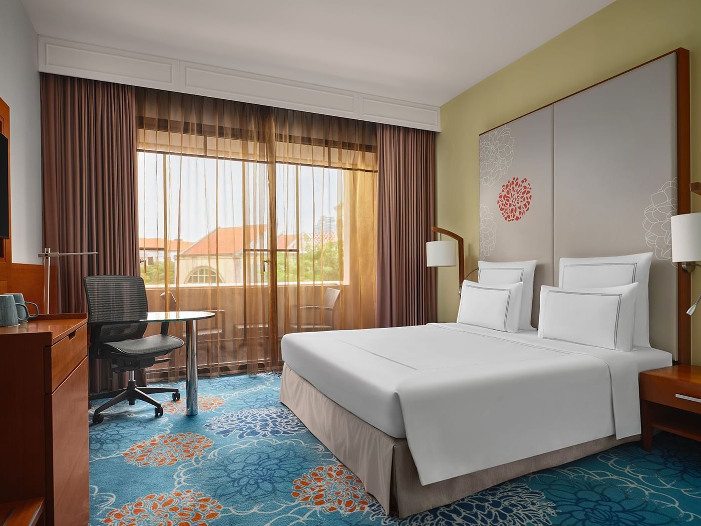 Cozy bed arranged in Premier King with Balcony at Paradox Singapore