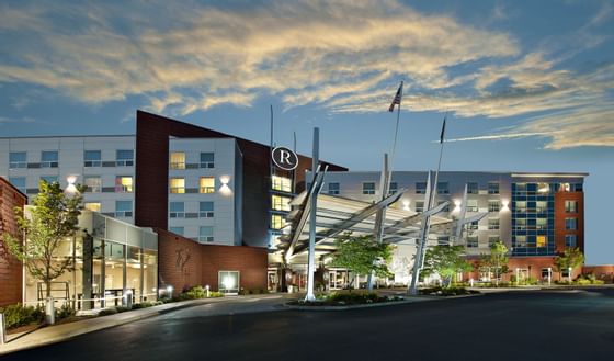 exterior of renaissance boston patriot place hotel at sunset