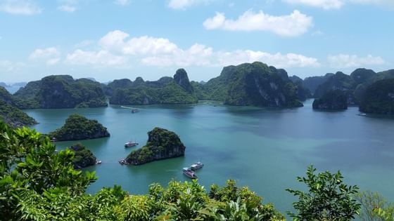 Ariel view of Hạ Long Bay river with fishing boats near Eastin Hotels
