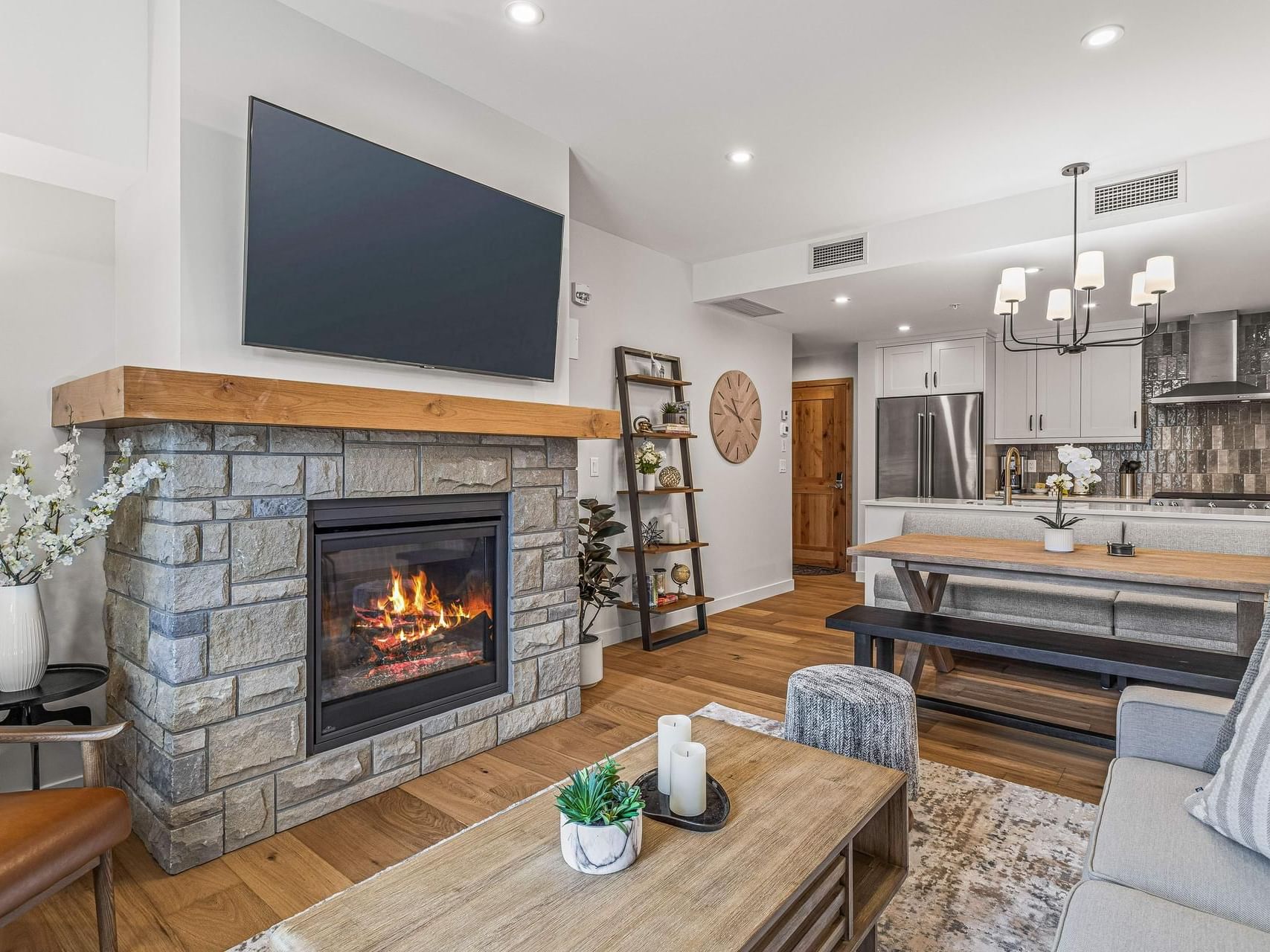 308 Timberstone Lodge Two Bedroom Premier Condo living room with adjacent kitchen area at Spring Creek Vacations