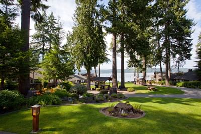 Cottage Lawn with lake view at Alderbrook Resort & Spa