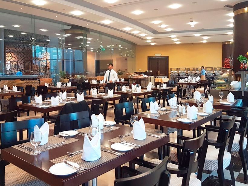 A table set-up in New Season Restaurant at City Seasons Hotels