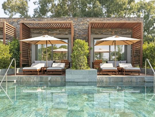 Poolside cabanas with loungers at Lagoon Golf Family Swim-up in Cullinan Belek