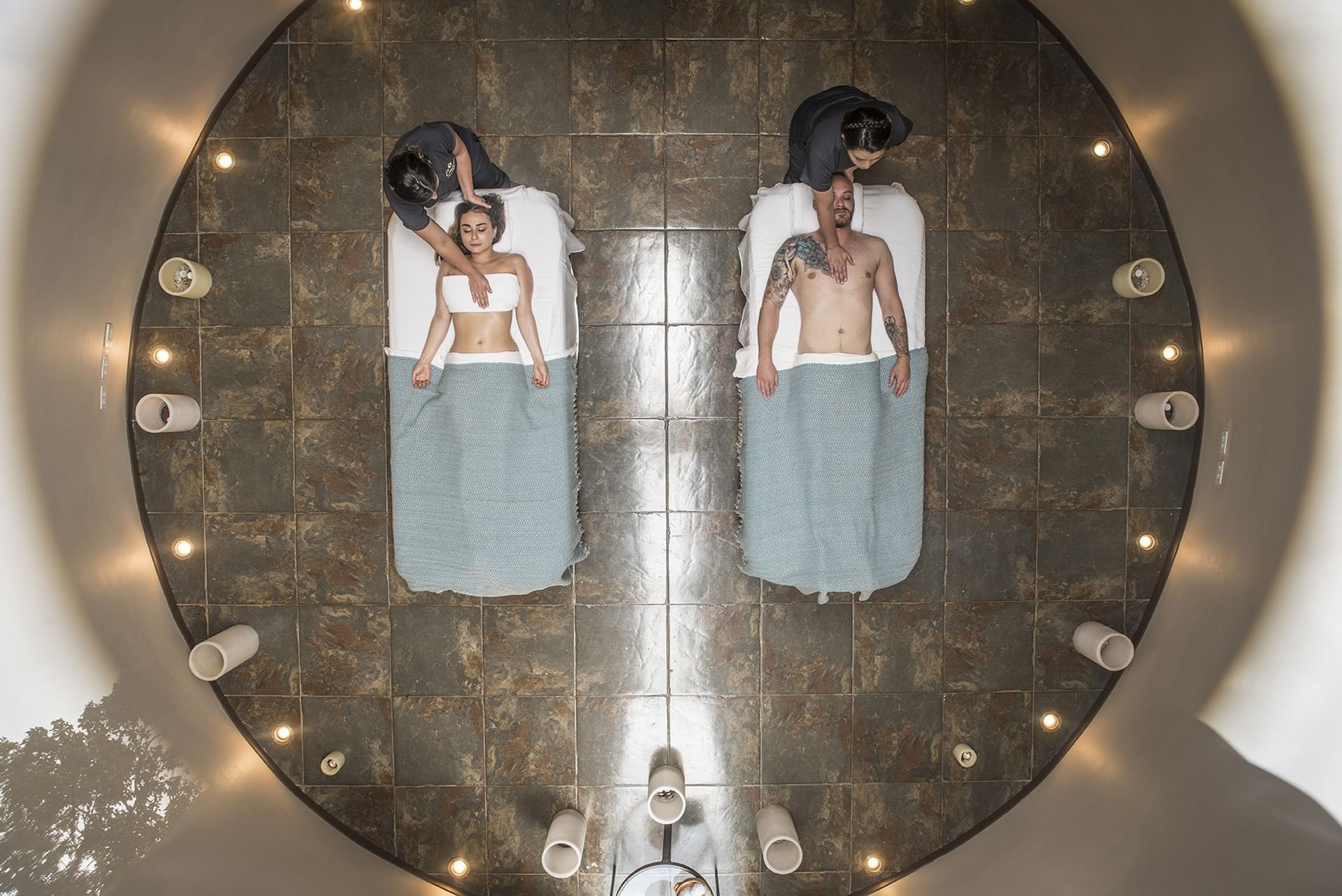 Aerial view of two people receiving a massage at El Silencio Lodge & Spa