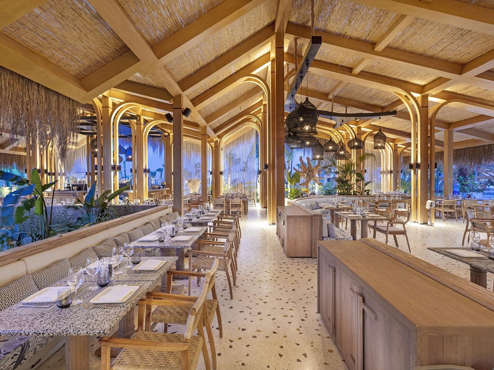 Tropical-themed dining area of Hasir Turkish Restaurant at Cullinan Belek