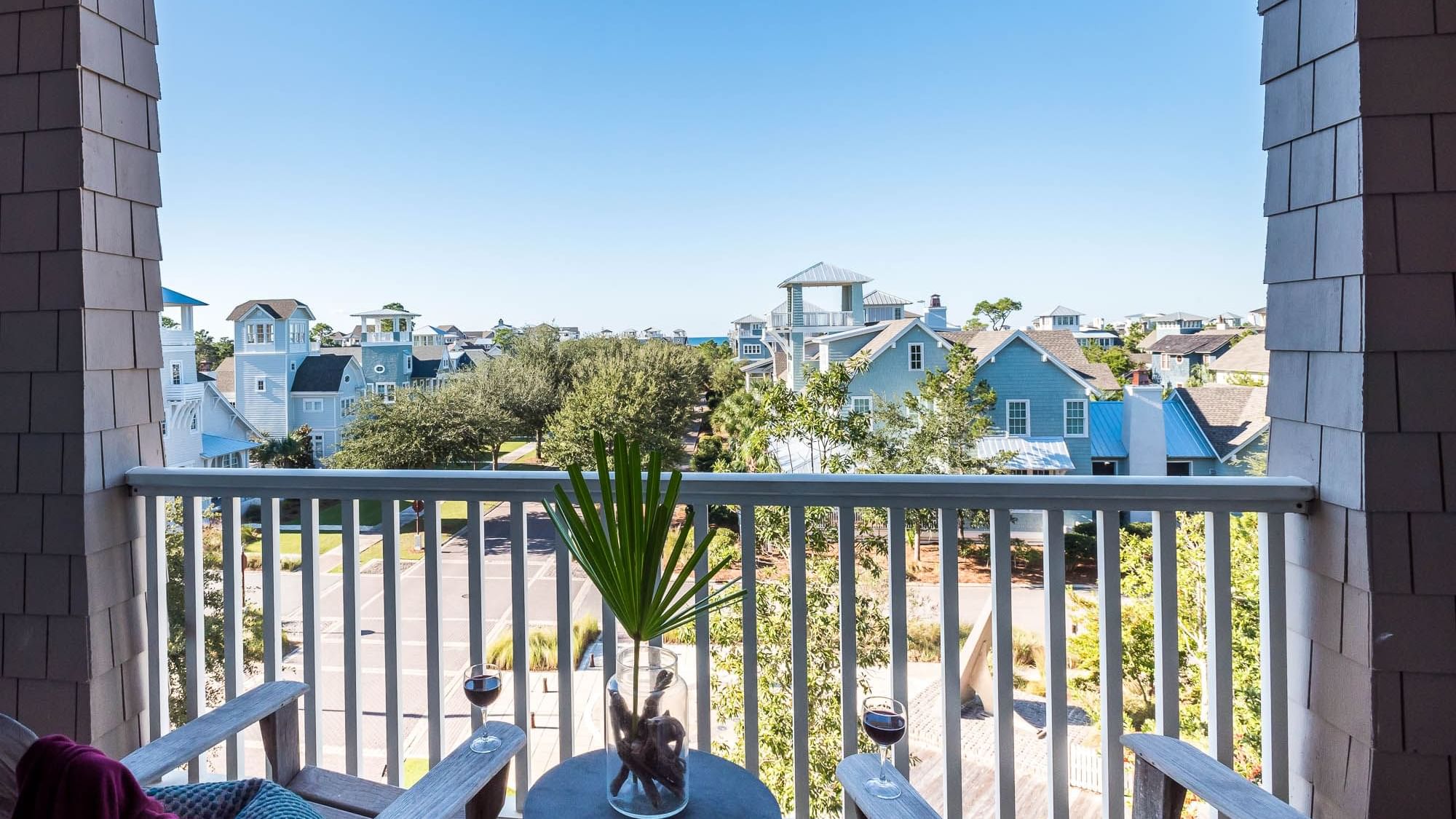 Balcony lounge area overlooking the complex in Premium Resort Suite at Watersound Inn