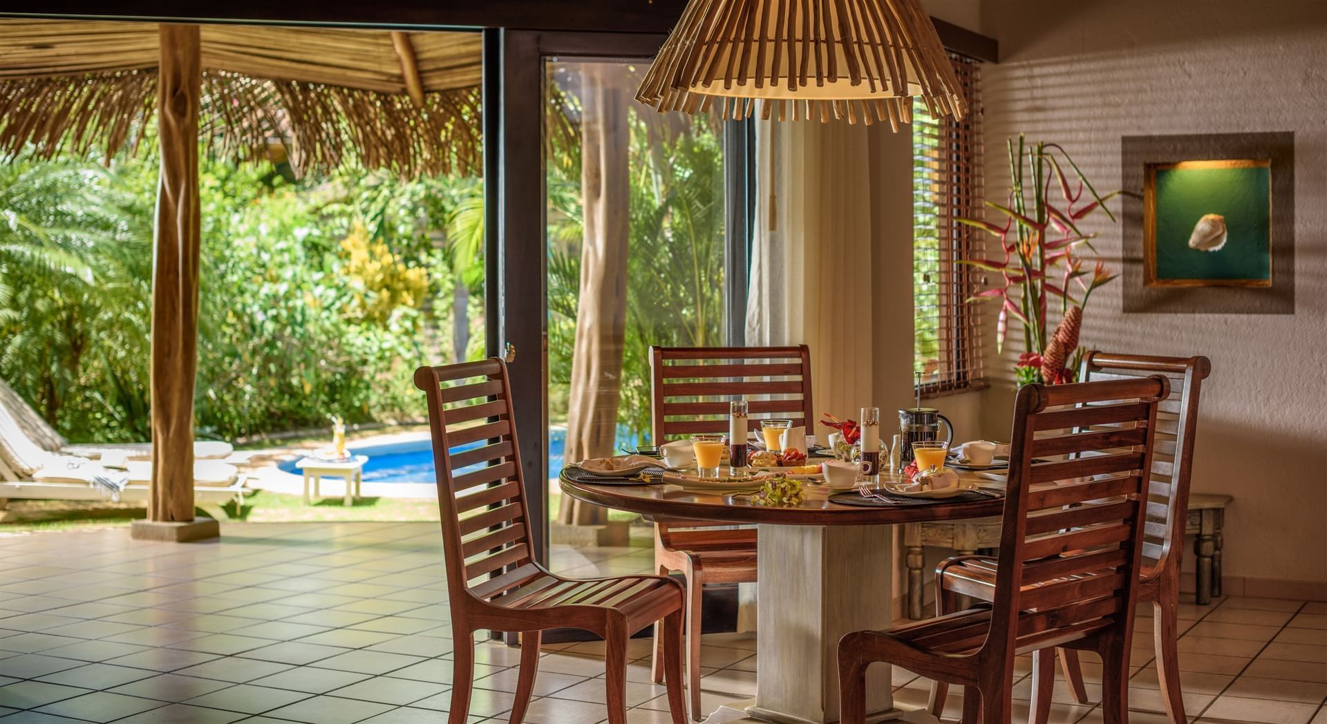 Dining & lounge area in a villa at Cala Luna Boutique Hotel