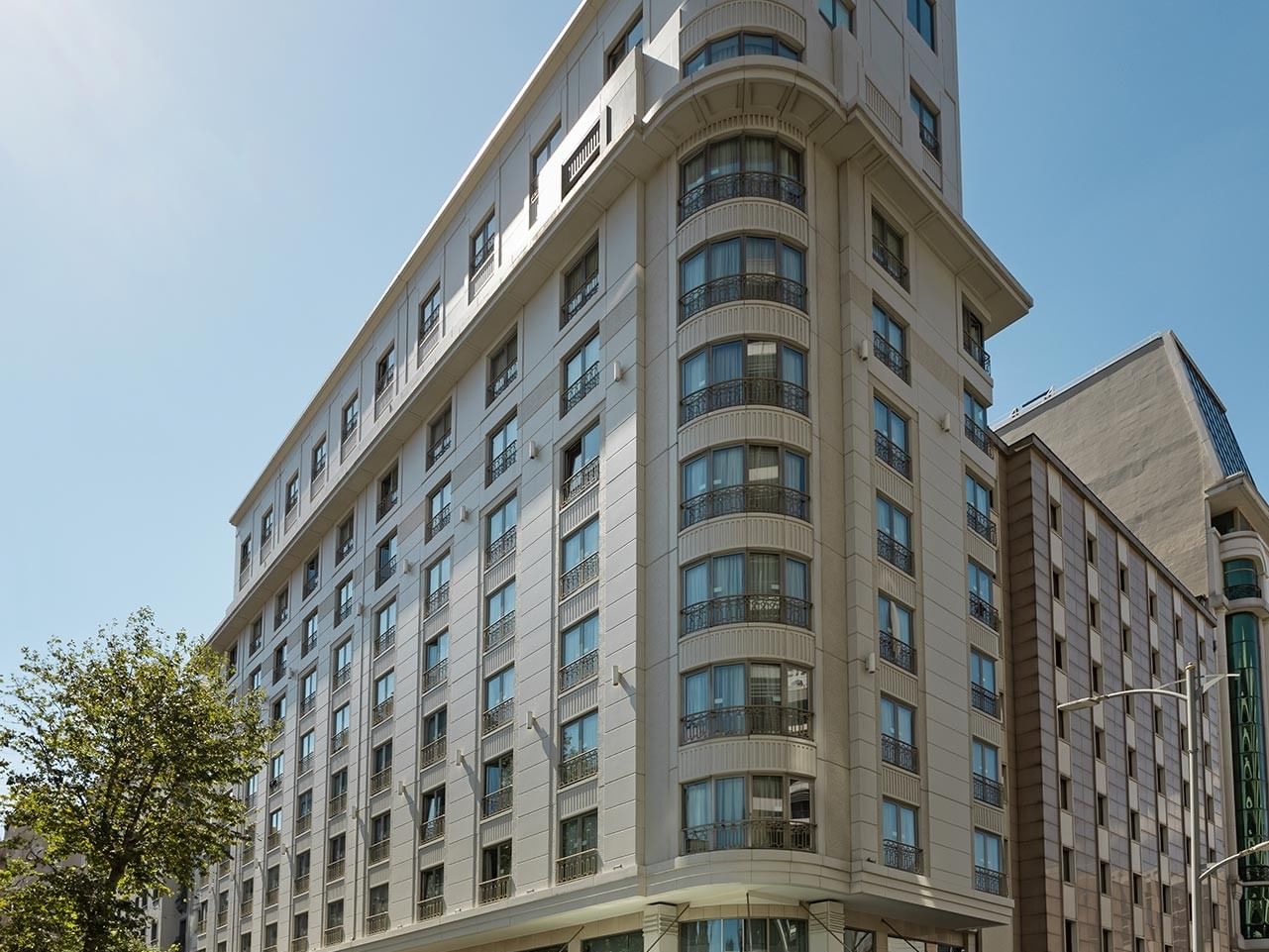 Titanic City Taksim exterior view set against a clear blue sky.