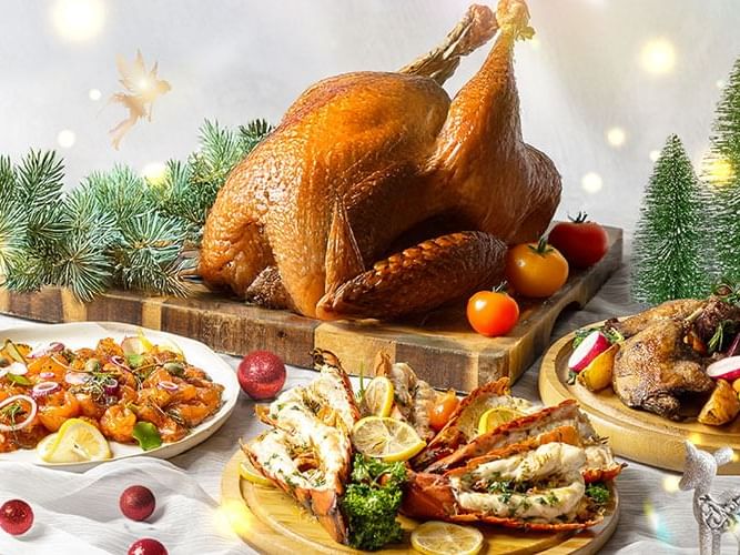 A festive table set with a golden turkey, succulent crab legs, and an array of delicious side dishes for a celebratory meal.