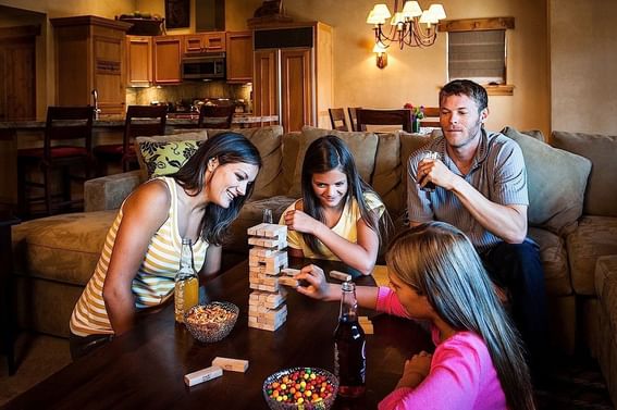 Family enjoying Games Night at Chateaux Deer Valley