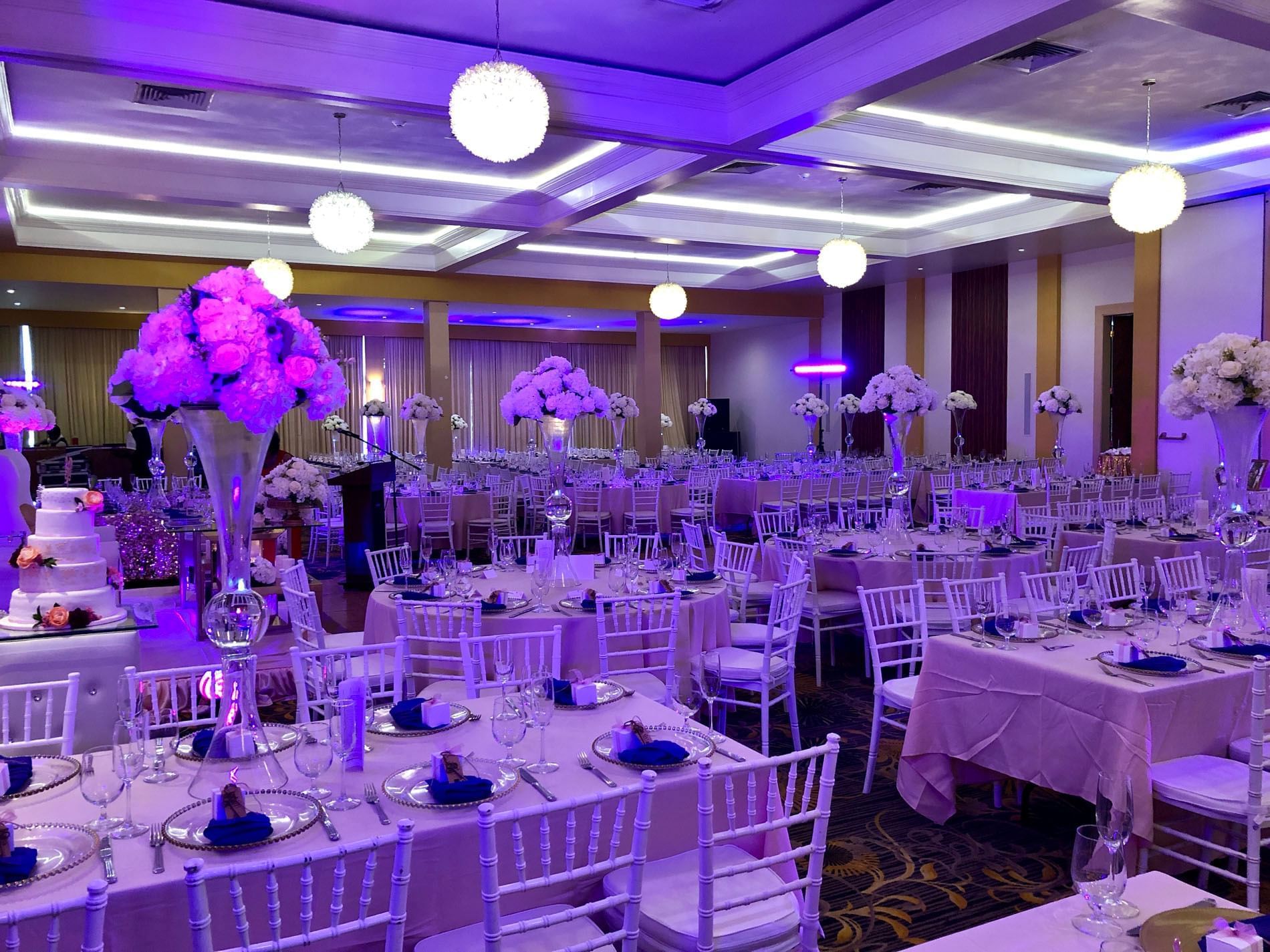 Event space with tables, cutlery & chairs, Pegasus Hotel Guyana