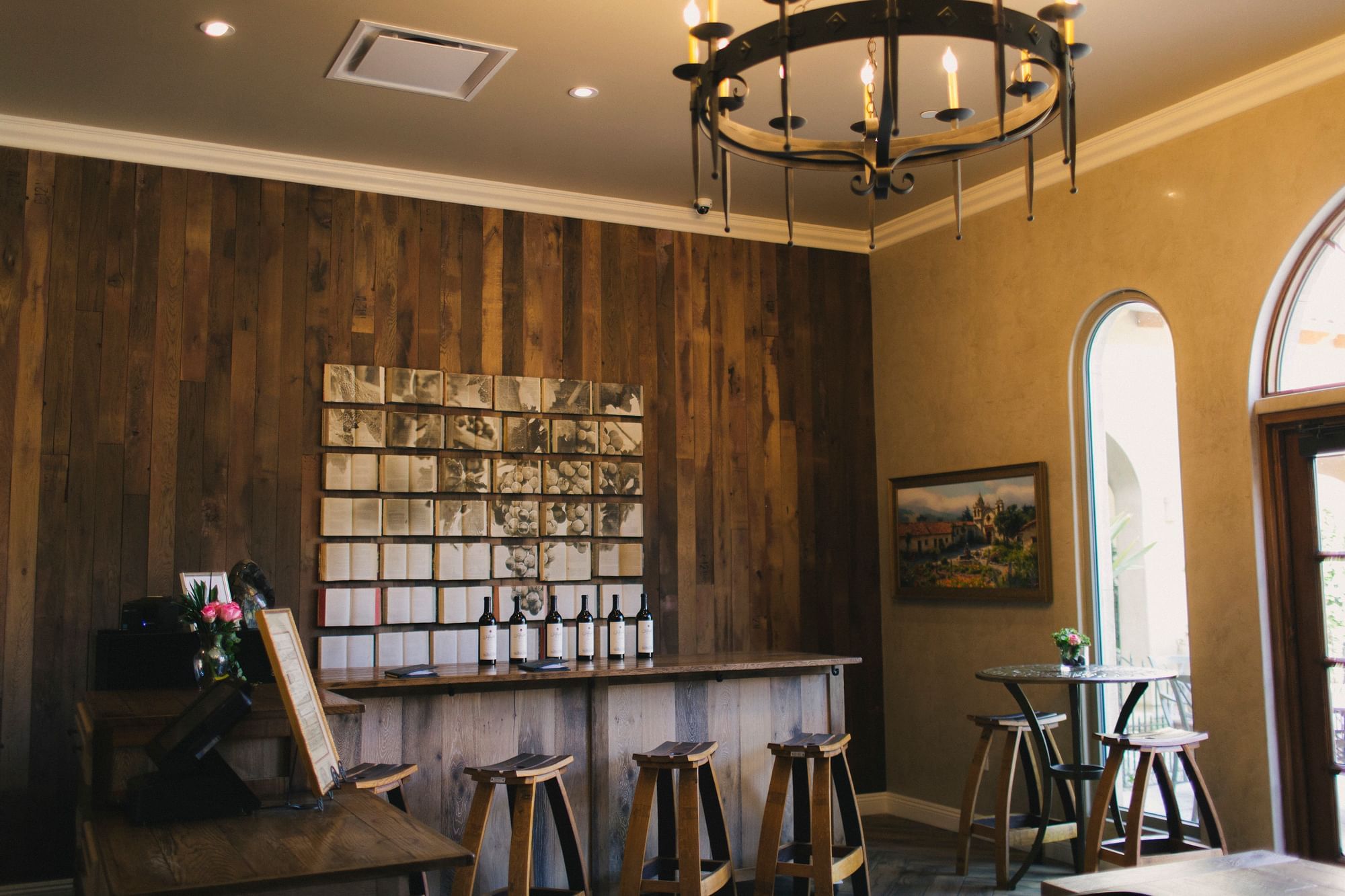 Wine tasting room with wine bar and Allegretto wine bottles line