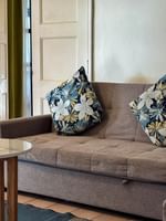 Suite with couch and table at The Naviti Resort - Fiji, Korolevu.