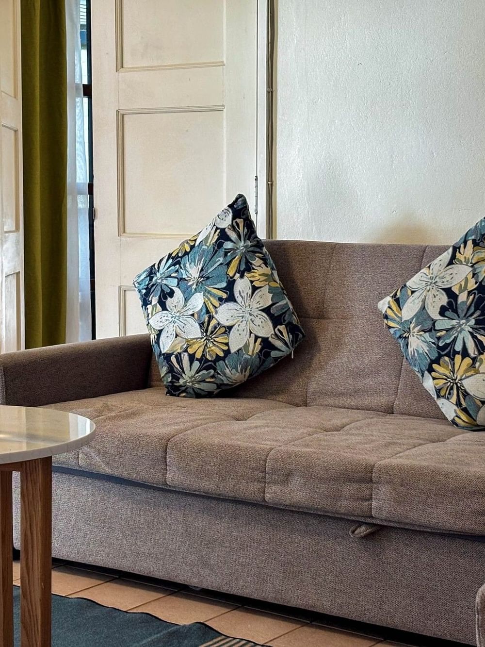 Suite with couch and table at The Naviti Resort - Fiji, Korolevu.