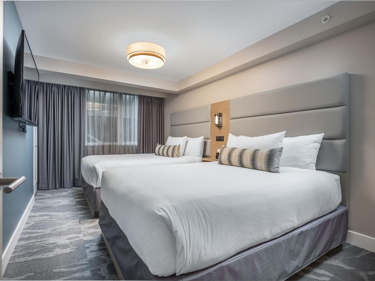 View of the second bedroom with two beds