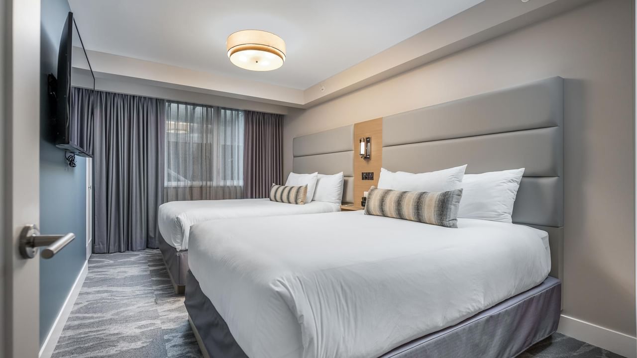 View of the second bedroom with two beds