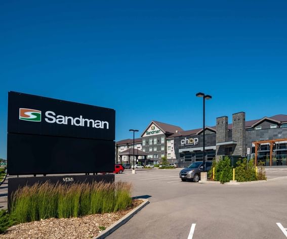 exterior and sandman sign of the sandman hotel in oakville