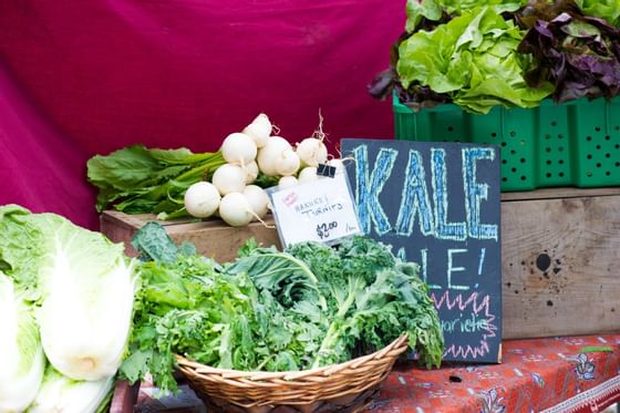 Fresh vegetables on a table in Kale Sale near Blackcomb Springs Suites