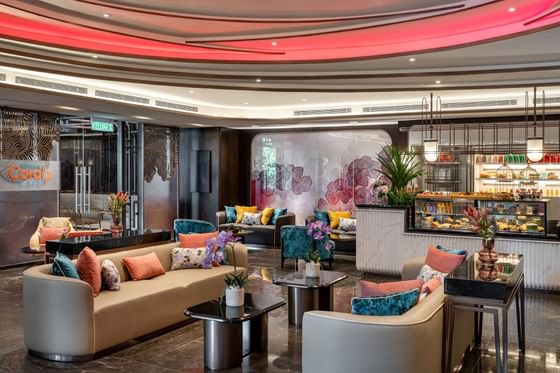 Modern elegance Coralz Café with cozy seating area at Imperial Lexis Kuala Lumpur
