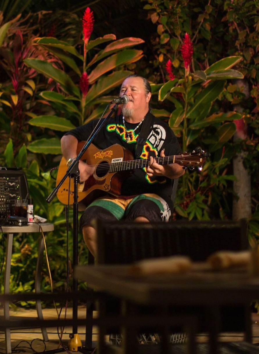A musical performance by the pool at Maui Coast Hotel