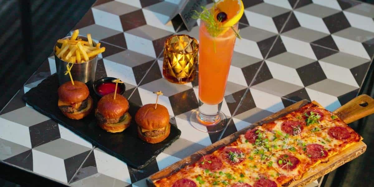 A table setting with a variety of food and drink