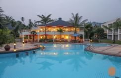 Evening view of the poolside at Lake Kivu Serena Hotel
