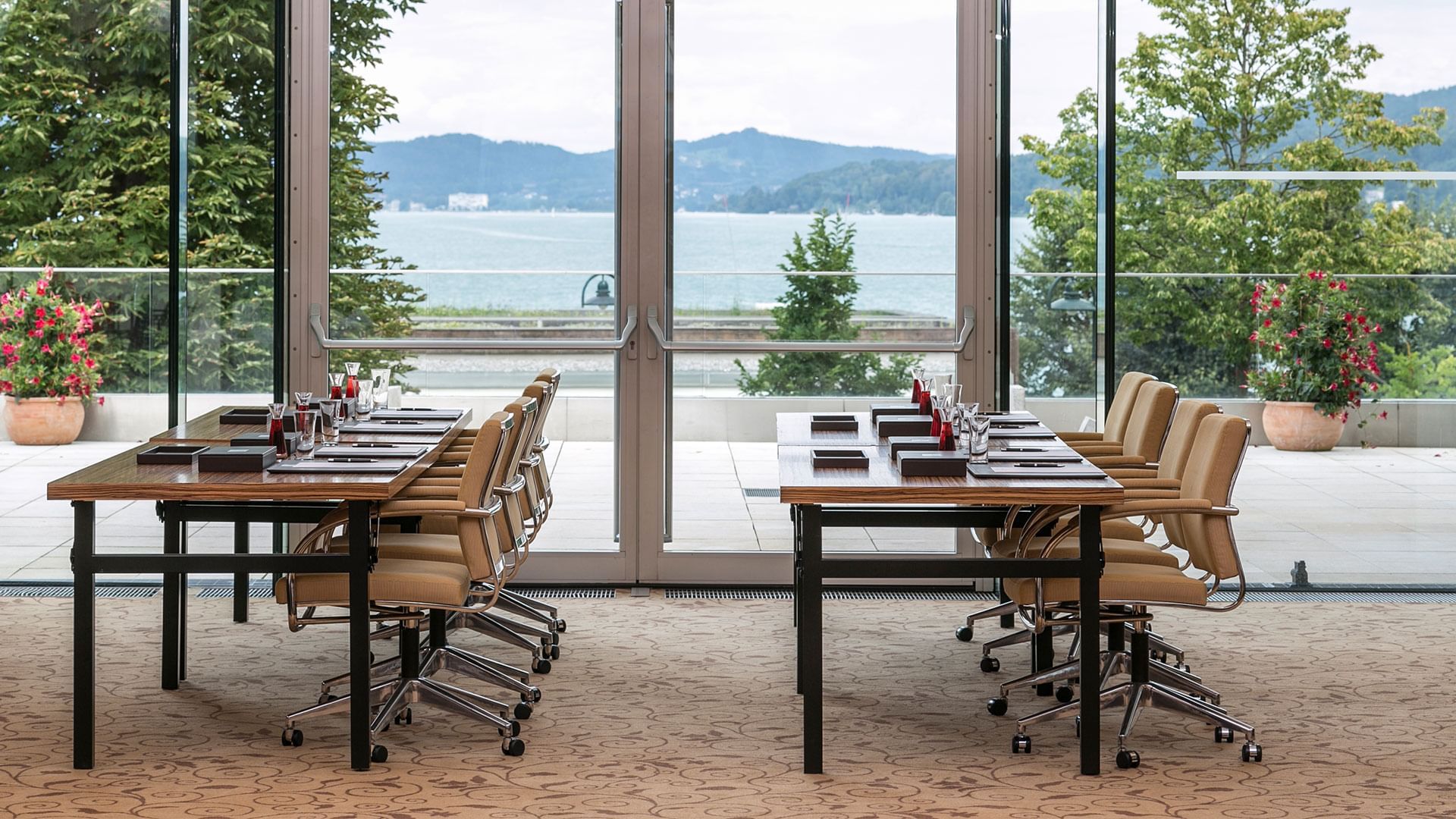 Meeting room arranged with a sea view & balcony at Falkensteiner Schlosshotel Velden